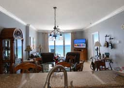 Emerald Isle 1309–Gulf-Front Corner Condo | Front-Row Beach Service Included